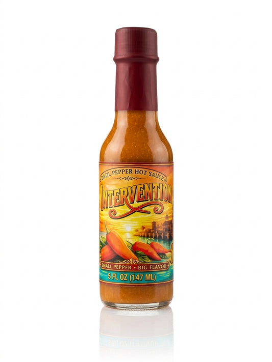Datil Be Devine Intervention hot sauce, 5 fl oz bottle with orange sauce, a black cap, and a colorful label on a white background